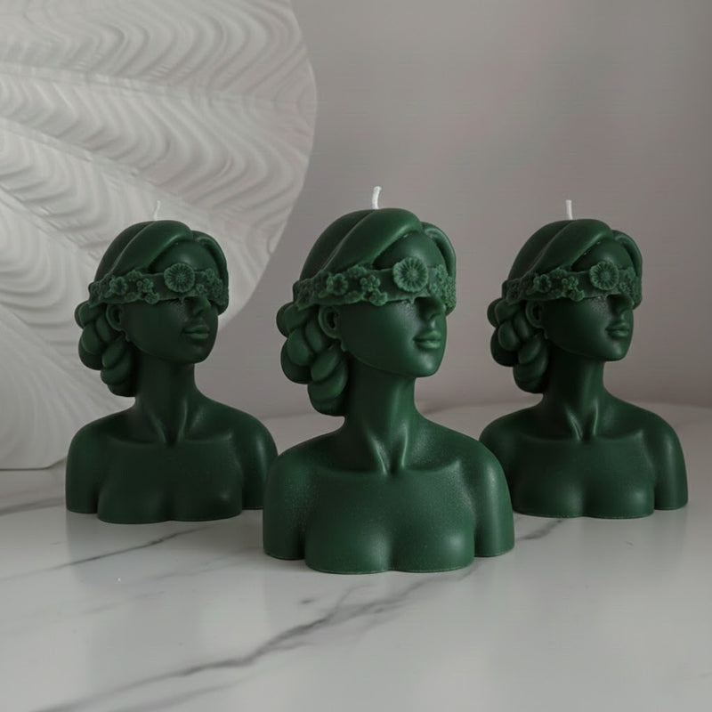 Blindfolded girl candle