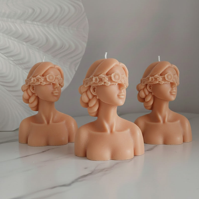Blindfolded girl candle