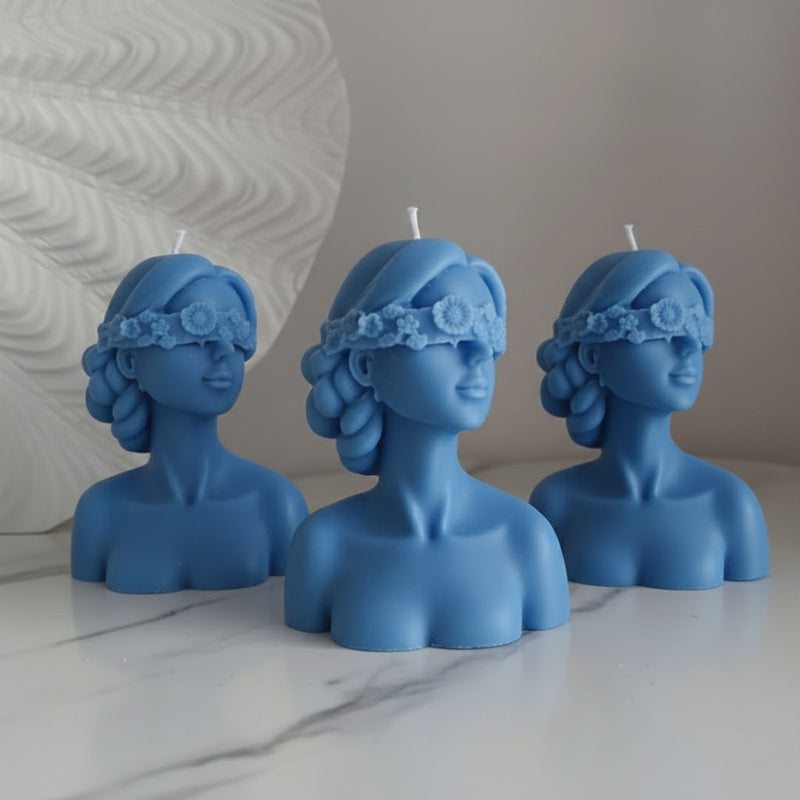 Blindfolded girl candle