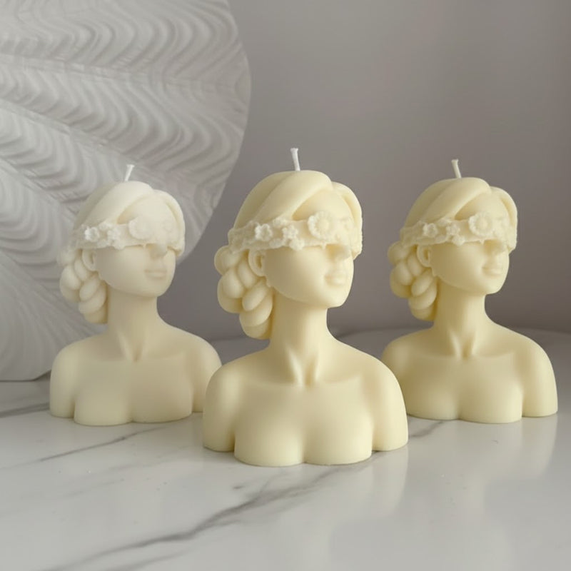 Blindfolded girl candle