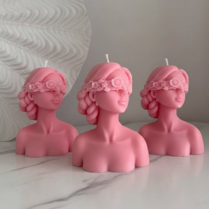 Blindfolded girl candle