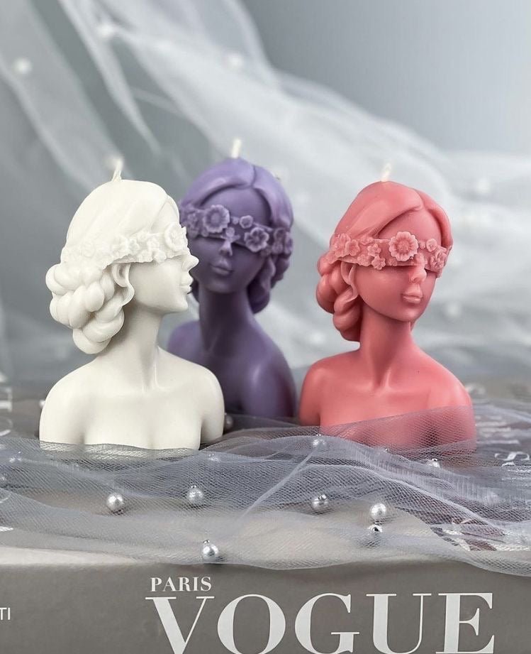 Blindfolded girl candle
